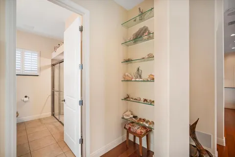 a view of a swimming pool with outdoor seating