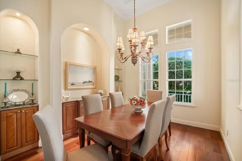 a kitchen with stainless steel appliances granite countertop a sink and stove