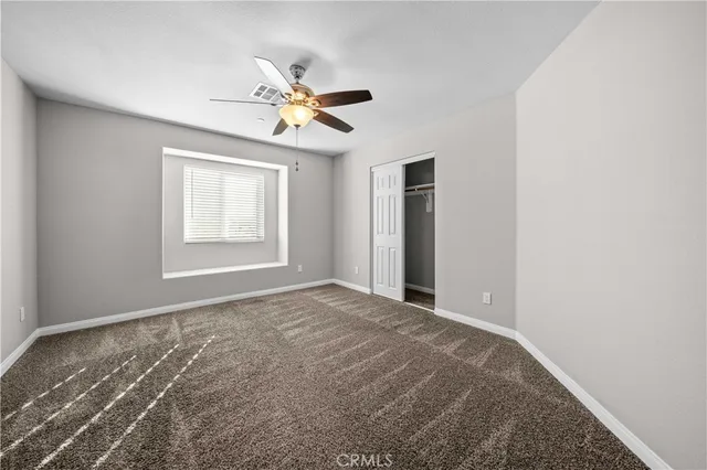 a view of a livingroom with a fan