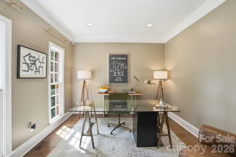 a open kitchen with stainless steel appliances granite countertop a stove and a sink