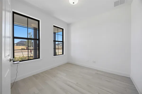 an empty room with windows