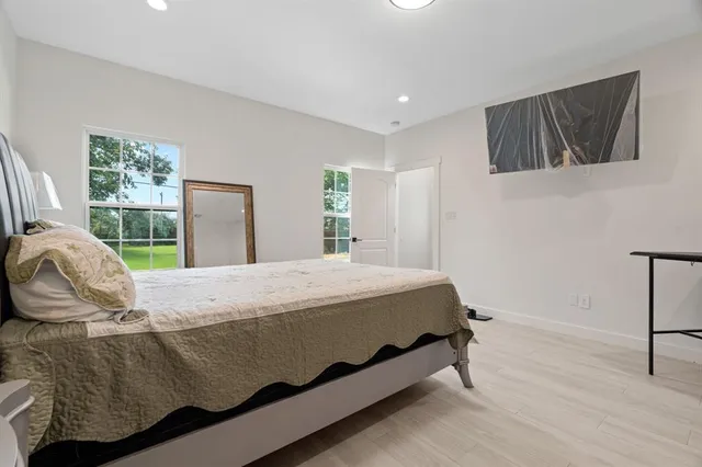 a bathroom with double vanity sink and a mirror