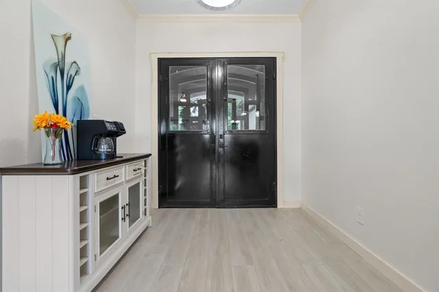 a kitchen with stainless steel appliances a refrigerator and stove