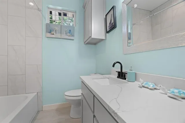 a house view with a garden space