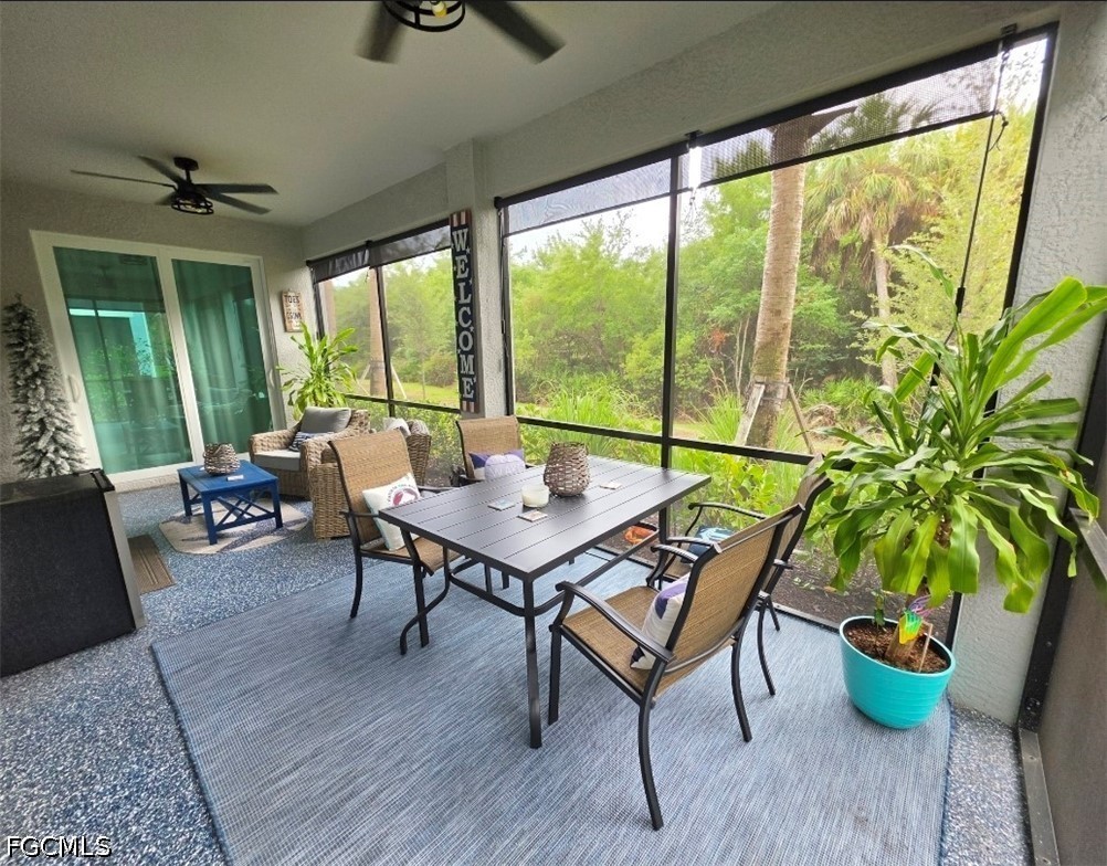 14191 Poppy Fld Loop, Unit 5312 Punta Gorda, FL 33955 - Photo 29 of 41 a living room with furniture and a potted plant