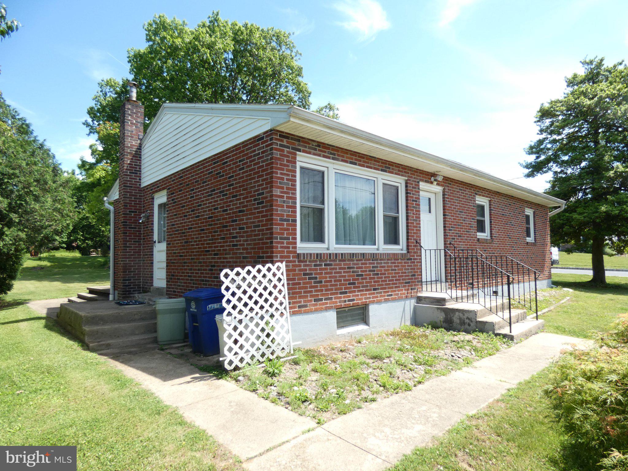 3 Ruth Avenue Wernersville, PA 19565 - Photo 6 of 6 Charming brick home with lush surroundings.
