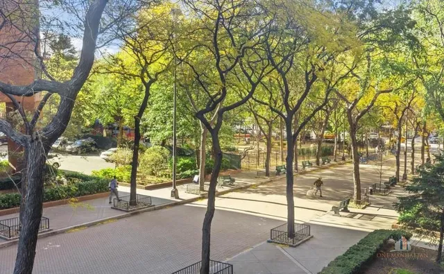 a view of a street with trees