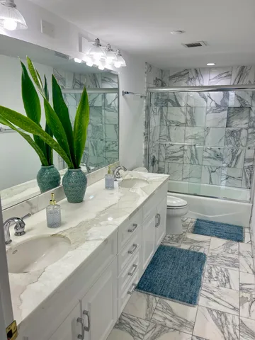 a view of a dining room with furniture and a table