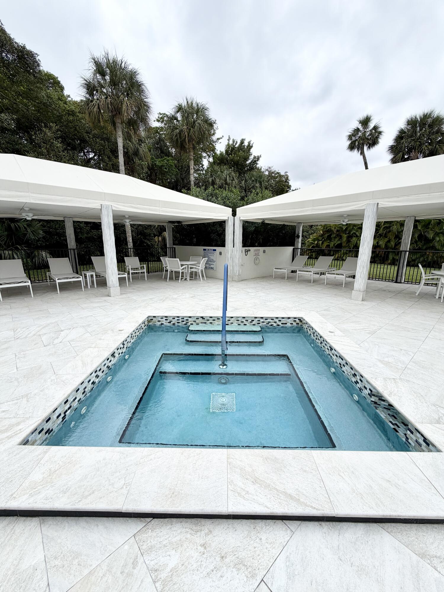 2001 North Ocean Boulevard, Unit 301 Boca Raton, FL 33431 - Photo 25 of 41 a view of a house with backyard porch and sitting area