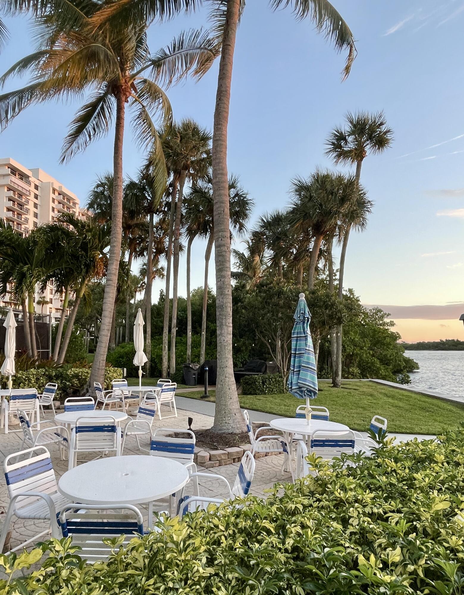 2001 North Ocean Boulevard, Unit 301 Boca Raton, FL 33431 - Photo 3 of 41 a view of a swimming pool with a patio
