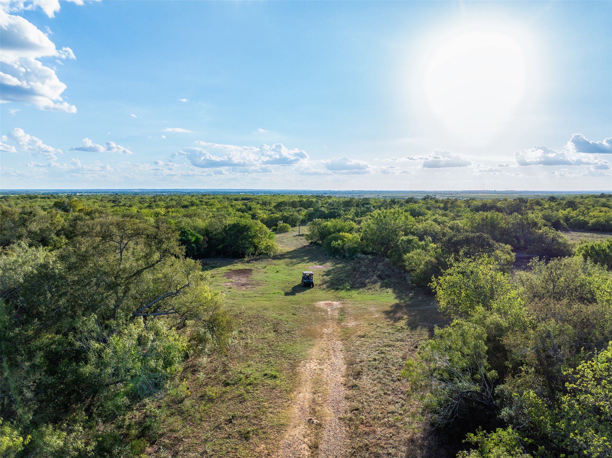 399 Seals Creek Road Lockhart, TX 78644 - Photo 39 of 40 Drone / aerial view of a heavily wooded area
