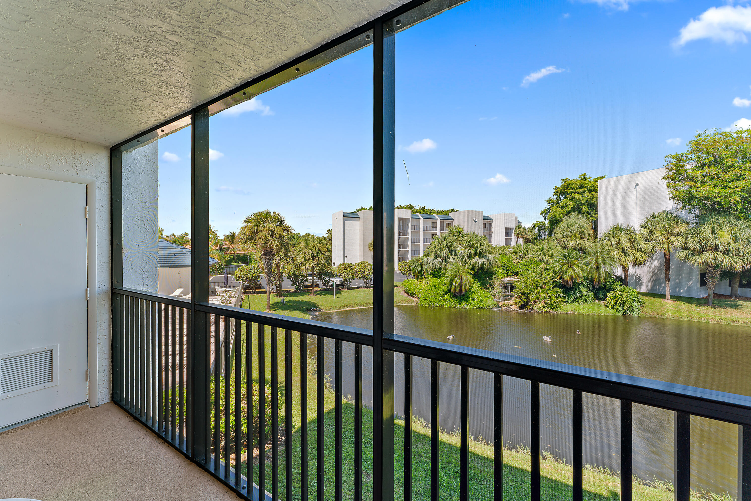 1605 Highway 1, Unit B201 Jupiter, FL 33477 - Photo 12 of 33 a view of a balcony with lake view