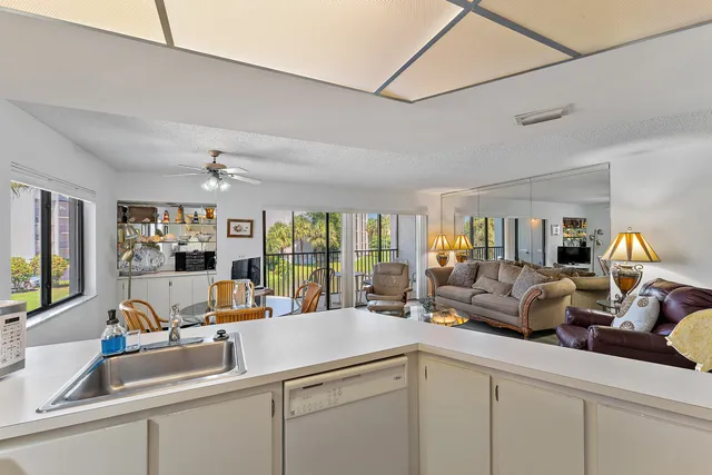 a view of living room with furniture and a flat screen tv