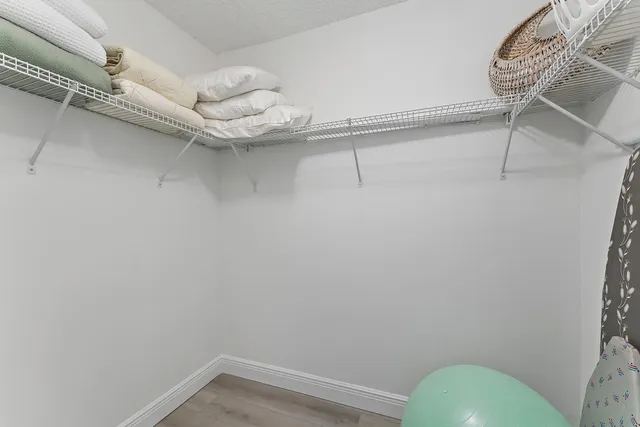 a view of a room with racks on the wall