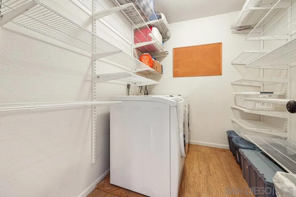 6780 Mission Gorge Road, Unit 12 San Diego, CA 92120 - Photo 14 of 23 a utility room with dryer and washer