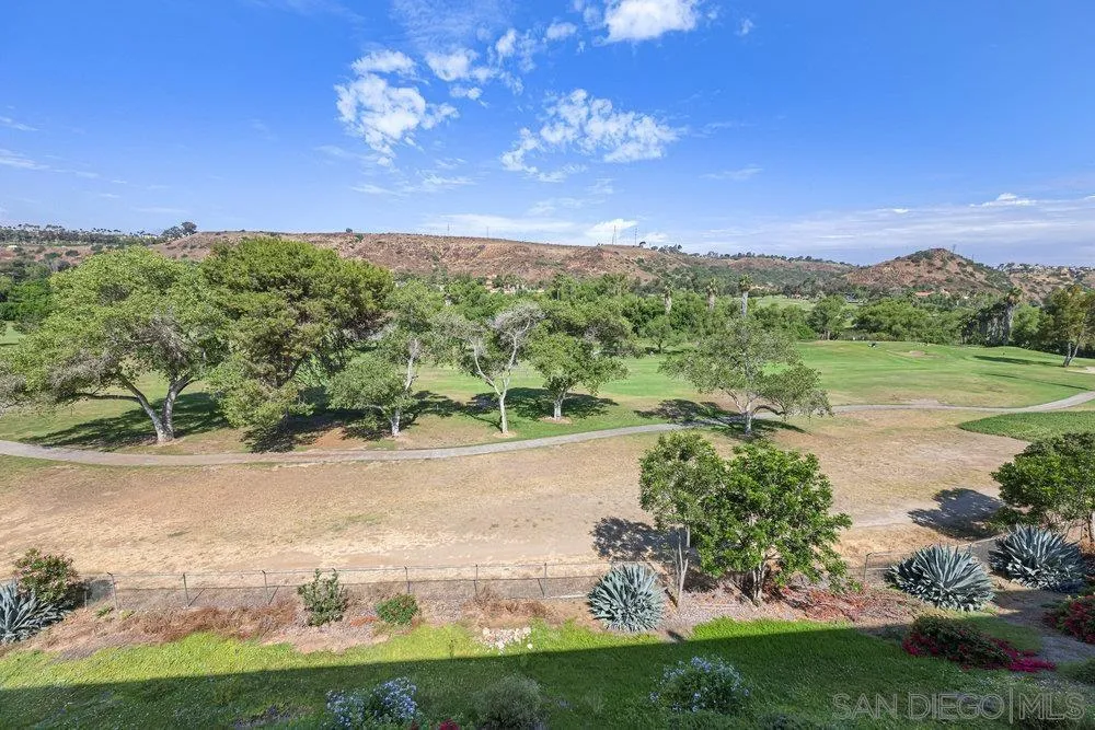 6780 Mission Gorge Road, Unit 12 San Diego, CA 92120 - Photo 16 of 23 a view of a lake with beach and outdoor space