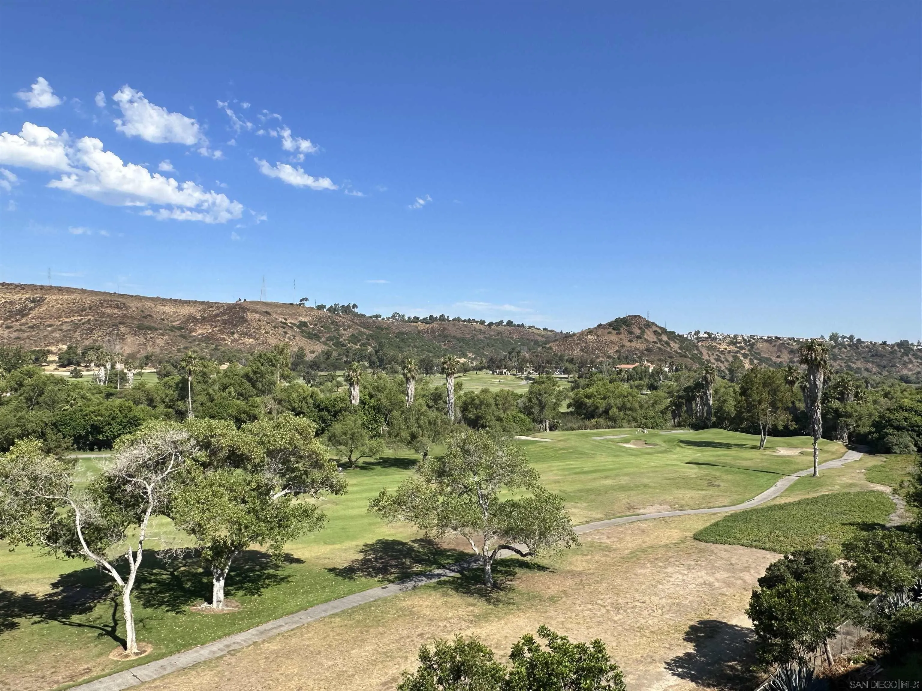 6780 Mission Gorge Road, Unit 12 San Diego, CA 92120 - Photo 18 of 23 a view of a city with tall trees
