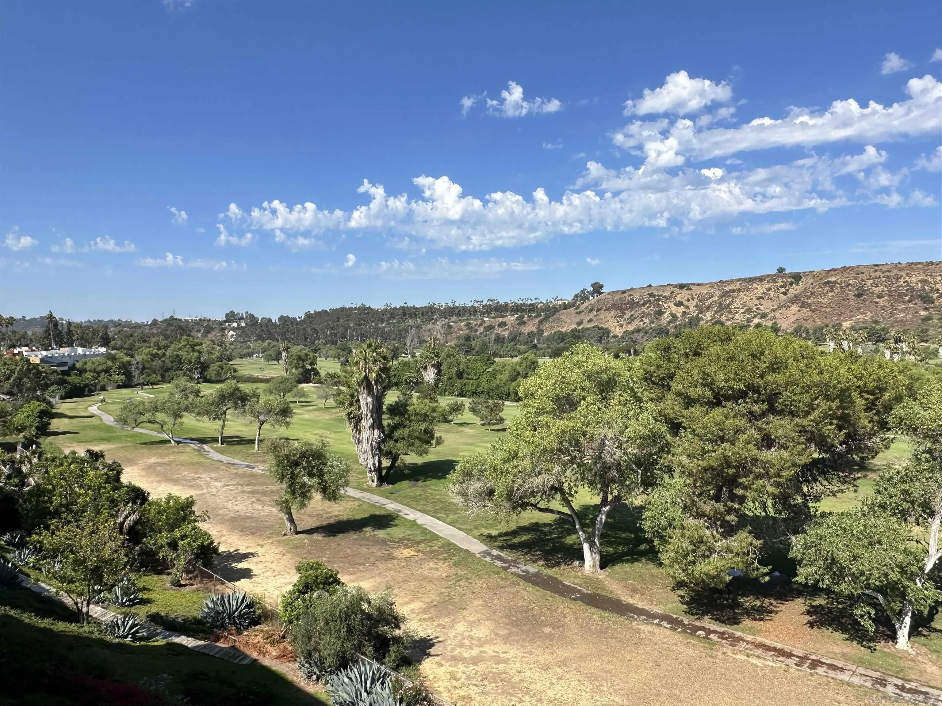 6780 Mission Gorge Road, Unit 12 San Diego, CA 92120 - Photo 19 of 23 a view of a city with lots of trees
