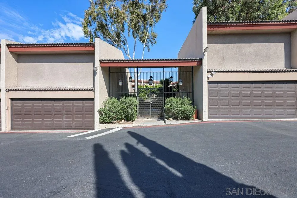 6780 Mission Gorge Road, Unit 12 San Diego, CA 92120 - Photo 23 of 23 a front view of a house with garden
