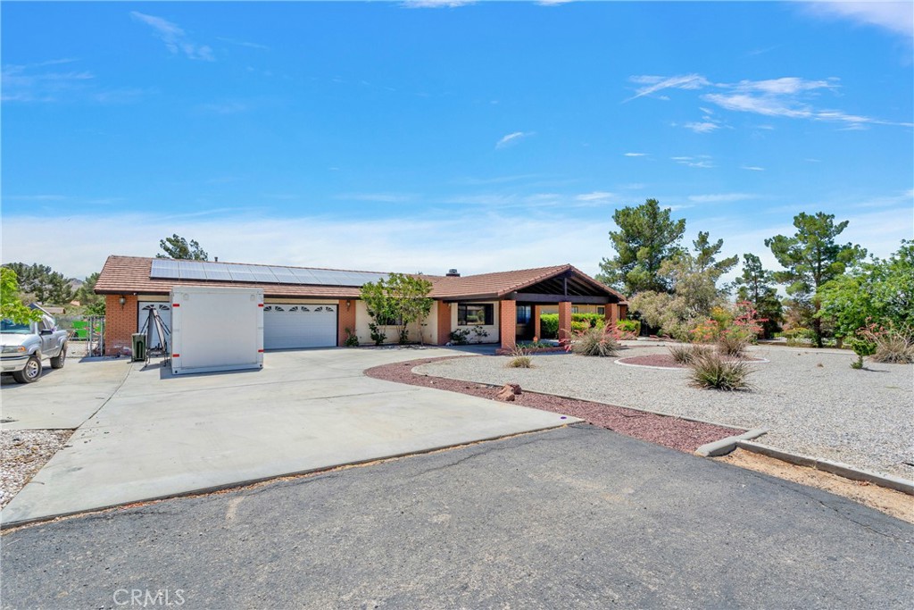 18759 Munsee Road Apple Valley, CA 92307 - Photo 1 of 1 front view of a house with a street