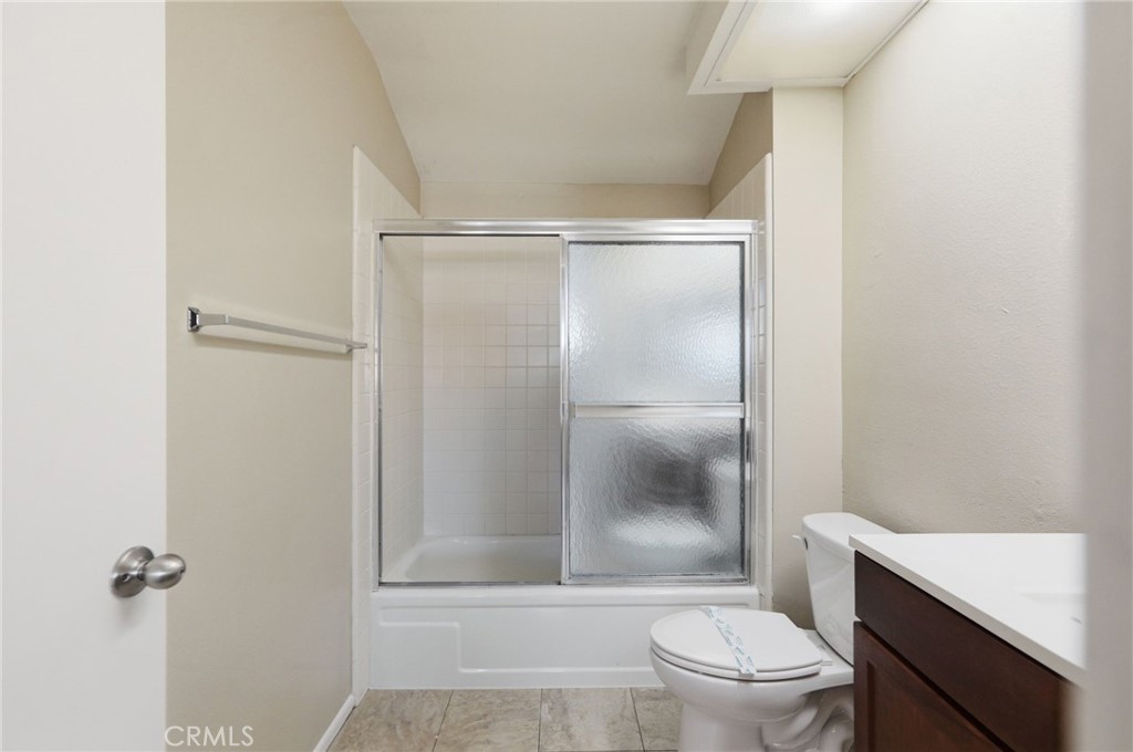 1420 Timberlane Drive Riverside, CA 92506 - Photo 42 of 61 a bathroom with a granite countertop sink toilet and shower