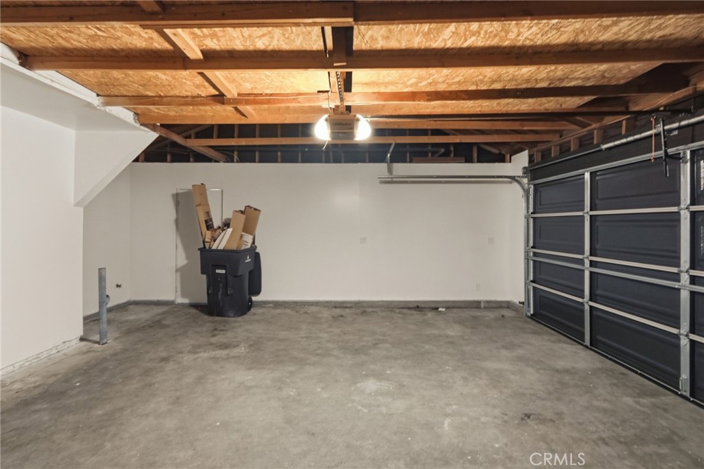 1420 Timberlane Drive Riverside, CA 92506 - Photo 51 of 61 a view of an empty room with racks on the wall
