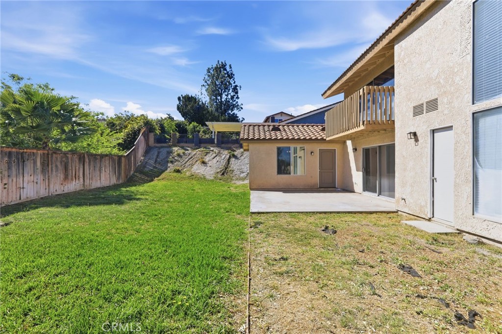 1420 Timberlane Drive Riverside, CA 92506 - Photo 52 of 61 a view of a house with a yard and potted plants