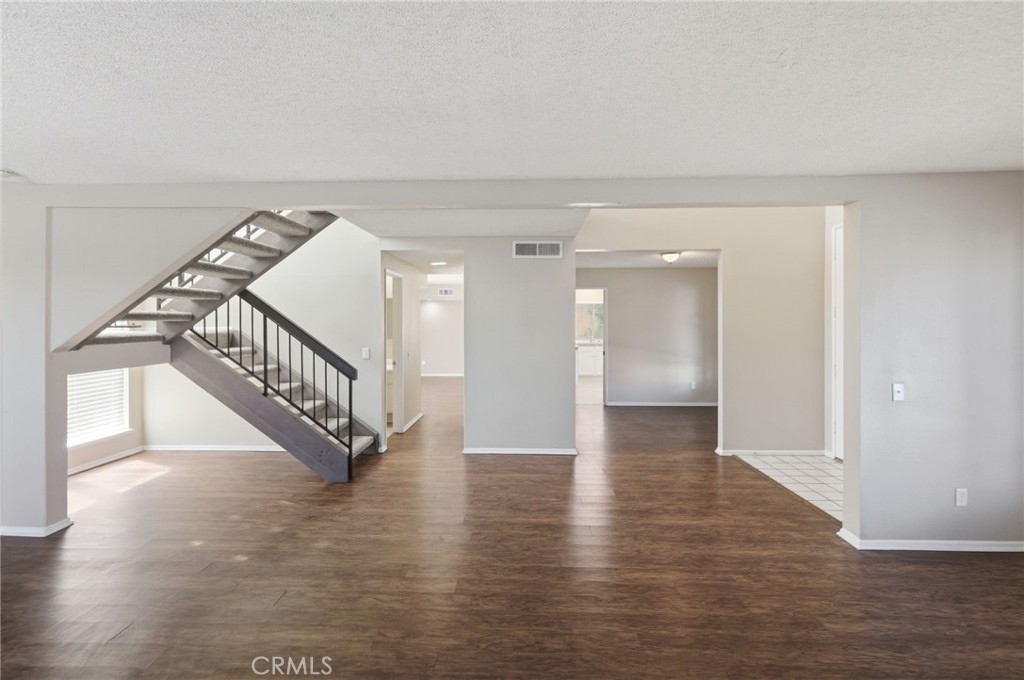 1420 Timberlane Drive Riverside, CA 92506 - Photo 6 of 61 a view of an entryway with wooden floor