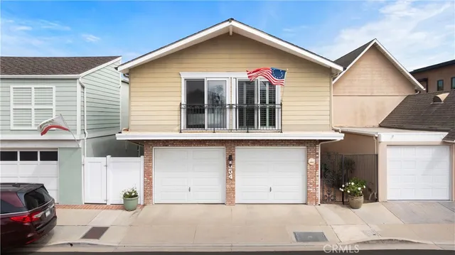 a front view of a house with garage