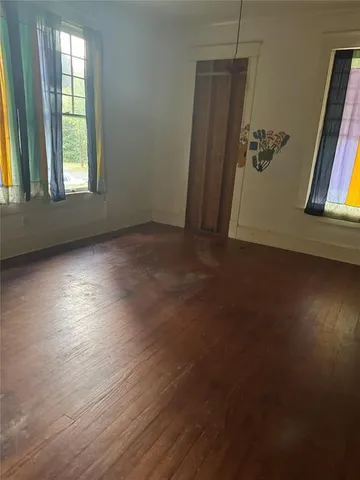 an empty room with windows