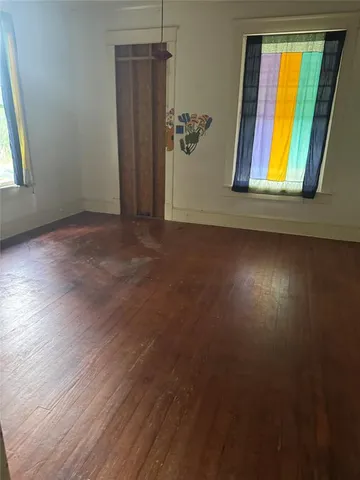 an empty room with windows