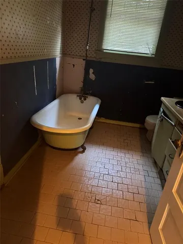 a bathroom with a sink and a toilet