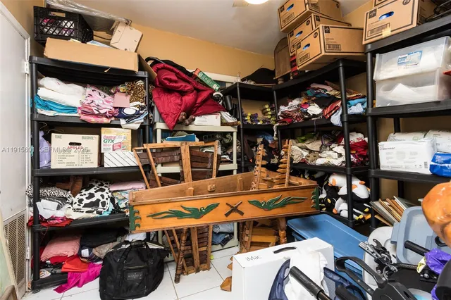 a kitchen with a sink and a stove top oven