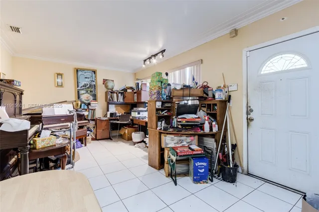 a view of a workspace with furniture
