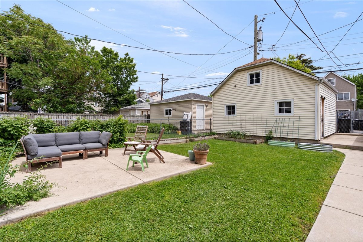 2735 North Ridgeway Avenue Chicago, IL 60647 - Photo 33 of 40 a view of a backyard with sitting area