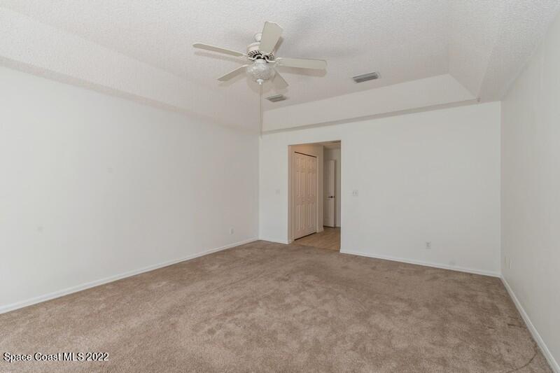 711 Montclair Road Northeast Palm Bay, FL 32905 - Photo 19 of 35 a view of an empty room