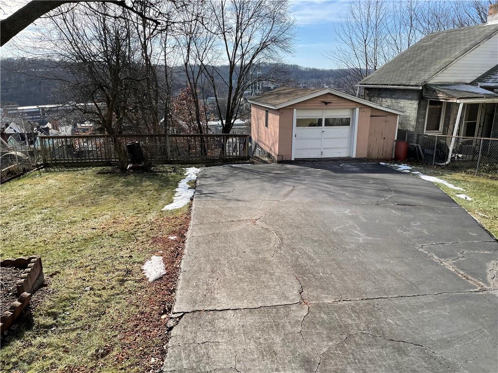 831 Railroad Street McKees Rocks, PA 15136 - Photo 2 of 16 a view of house with a yard