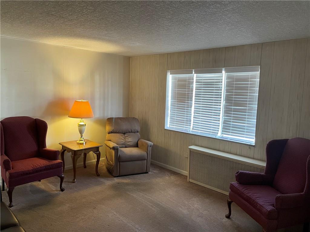 831 Railroad Street McKees Rocks, PA 15136 - Photo 7 of 16 a living room with furniture and a window
