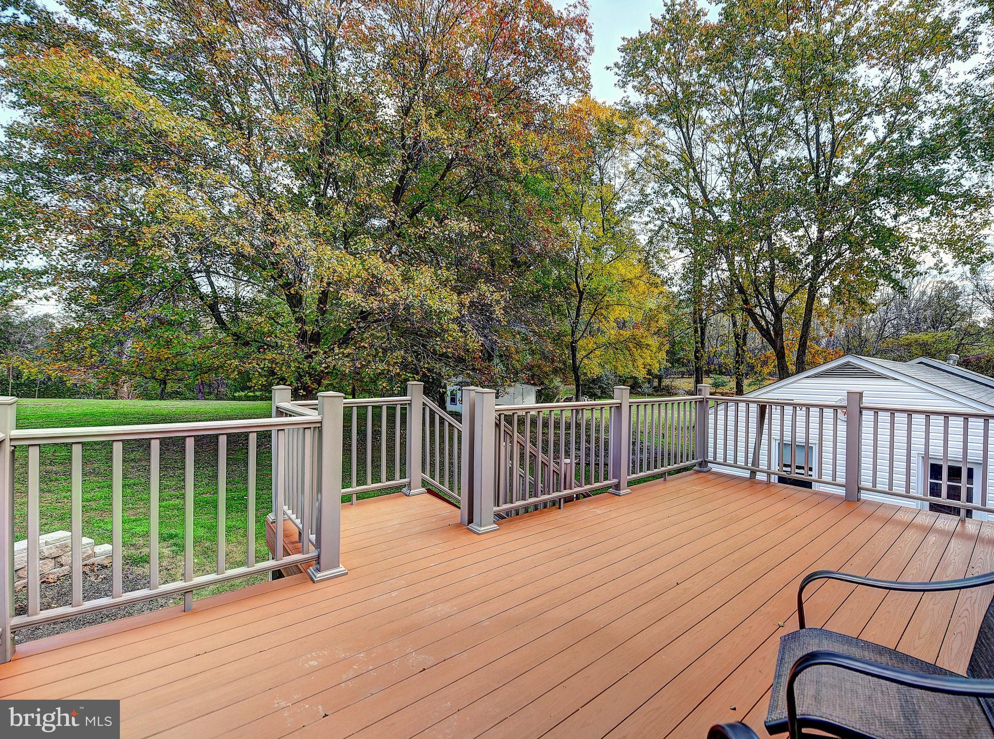 9200 Dogwood Road Baltimore, MD 21244 - Photo 20 of 25 a view of balcony with wooden floor and fence