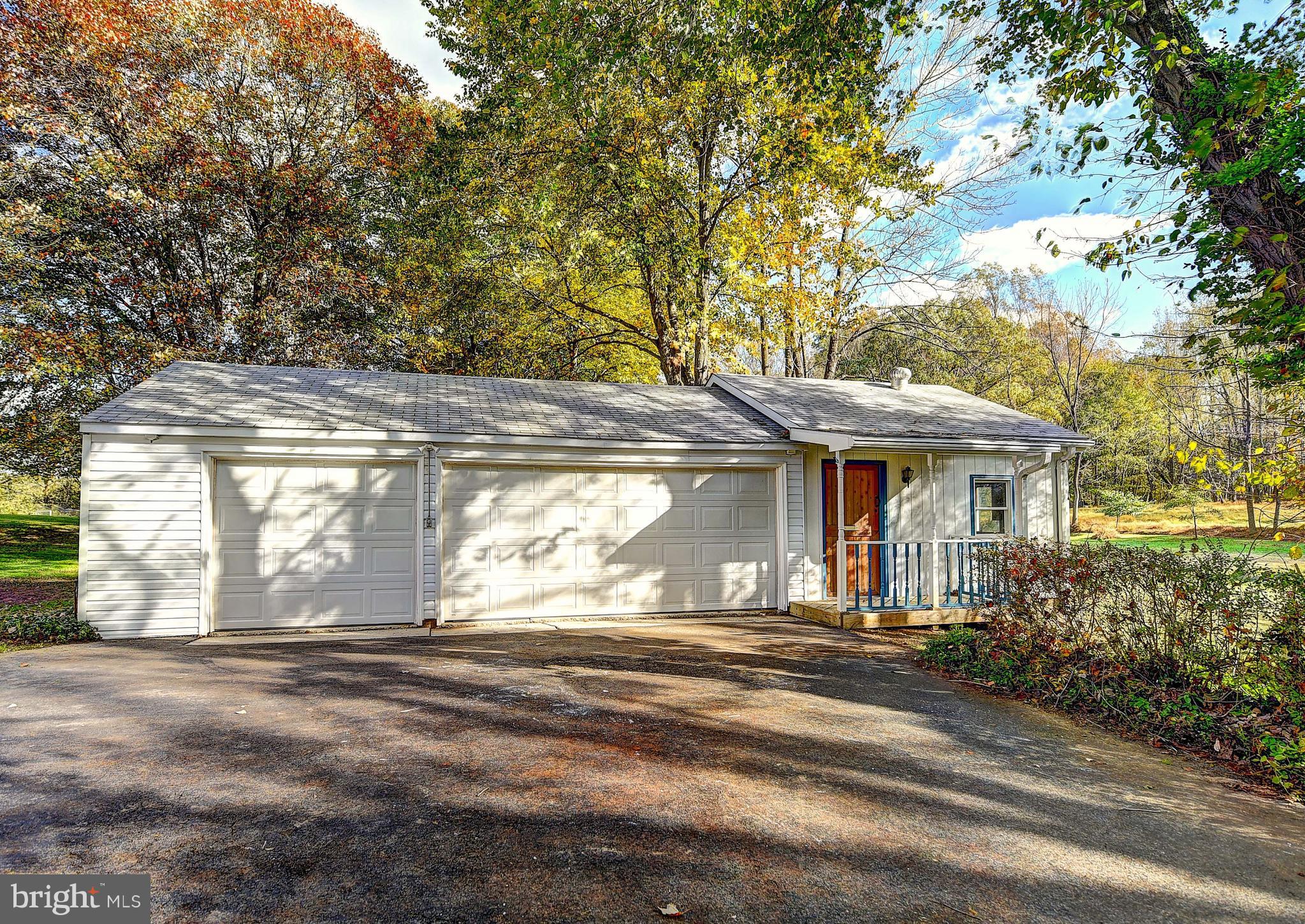9200 Dogwood Road Baltimore, MD 21244 - Photo 21 of 25 a front view of a house with a yard