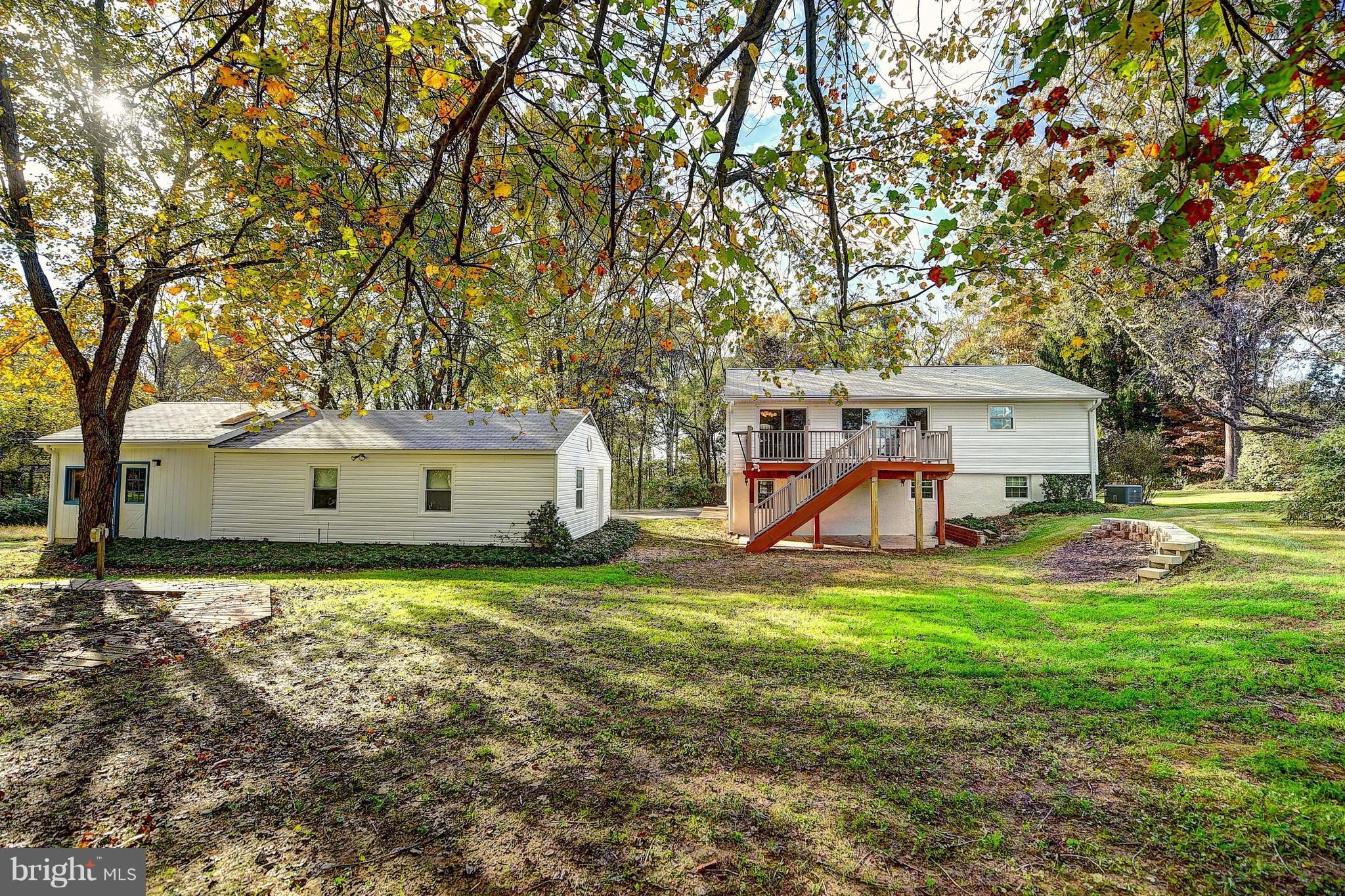 9200 Dogwood Road Baltimore, MD 21244 - Photo 23 of 25 a house view with a sitting space and a tree