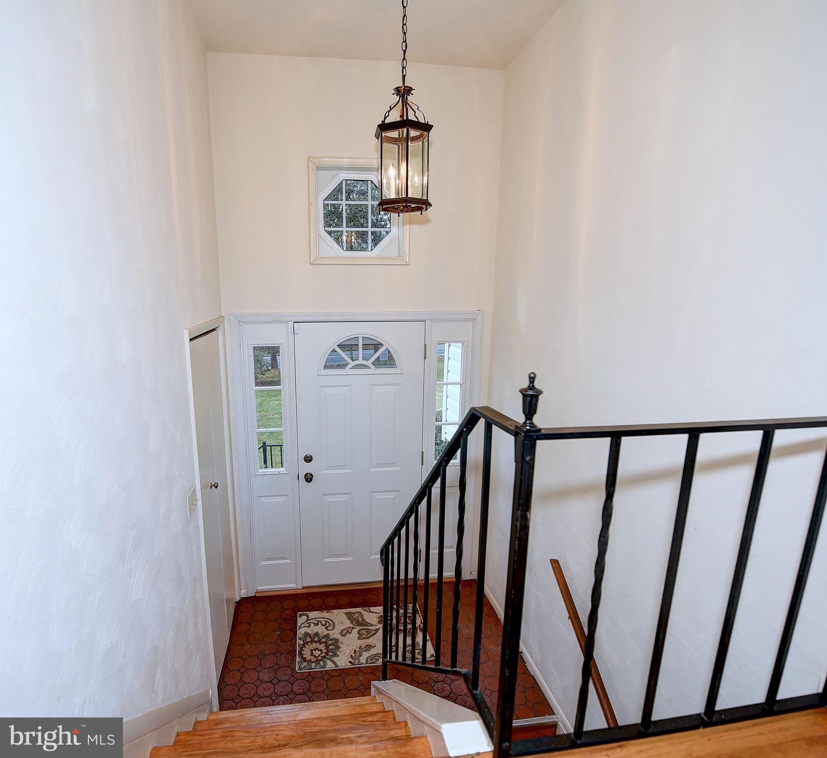 9200 Dogwood Road Baltimore, MD 21244 - Photo 6 of 25 a view of a hallway with seating area