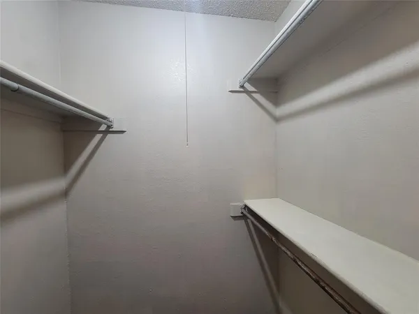 a view of small space with racks on the wall