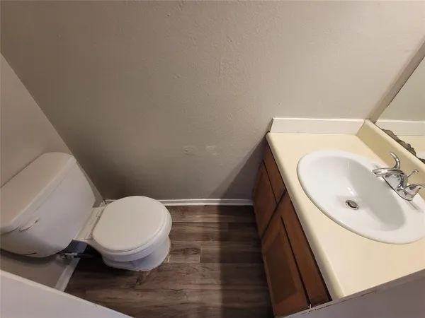 a bathroom with a sink and a toilet