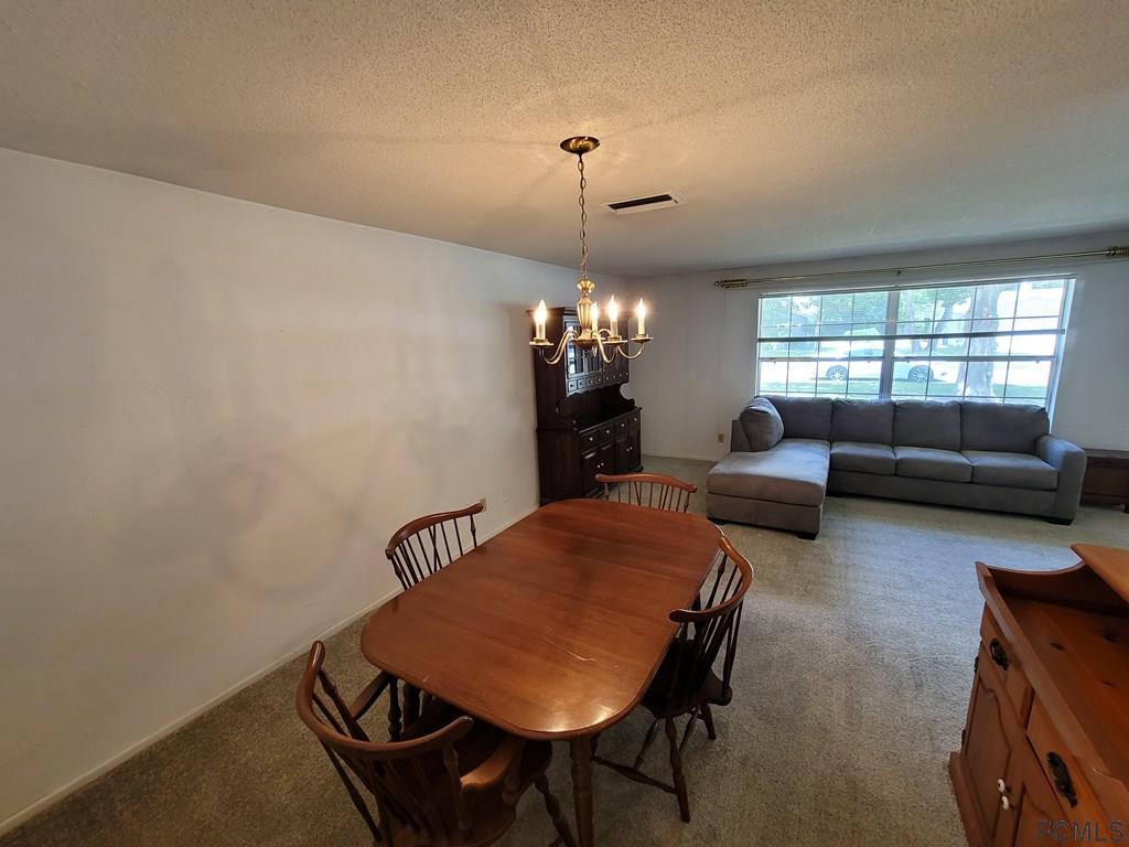 736 Lindenwood Circle Ormond Beach, FL 32174 - Photo 14 of 56 a outdoor space with furniture