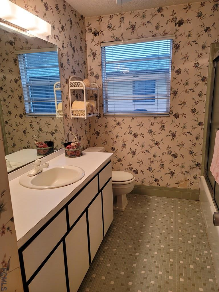 736 Lindenwood Circle Ormond Beach, FL 32174 - Photo 28 of 56 a bathroom with a sink and a mirror