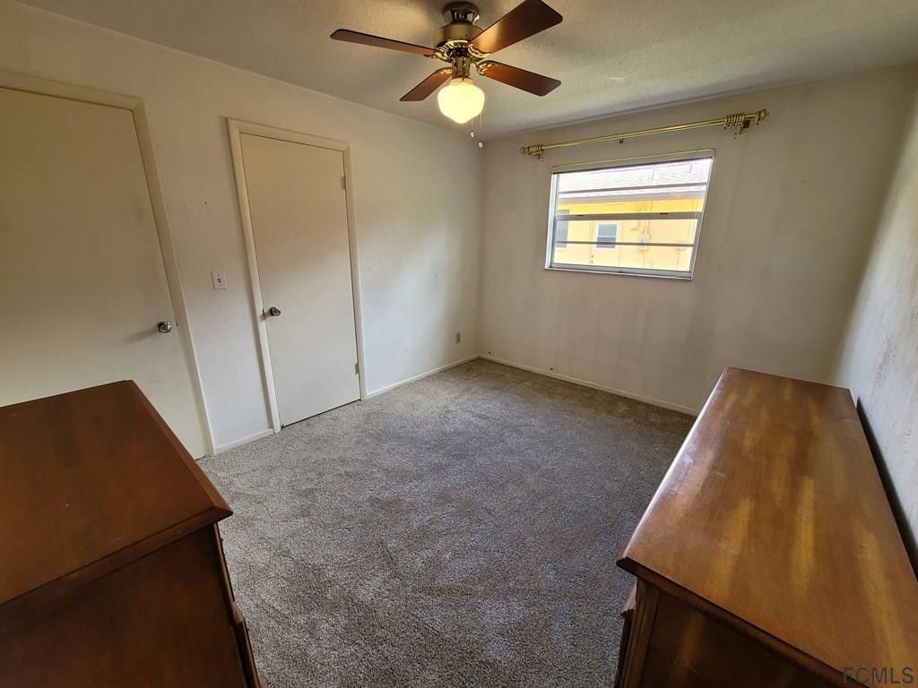 736 Lindenwood Circle Ormond Beach, FL 32174 - Photo 36 of 56 a view of an empty room with a window