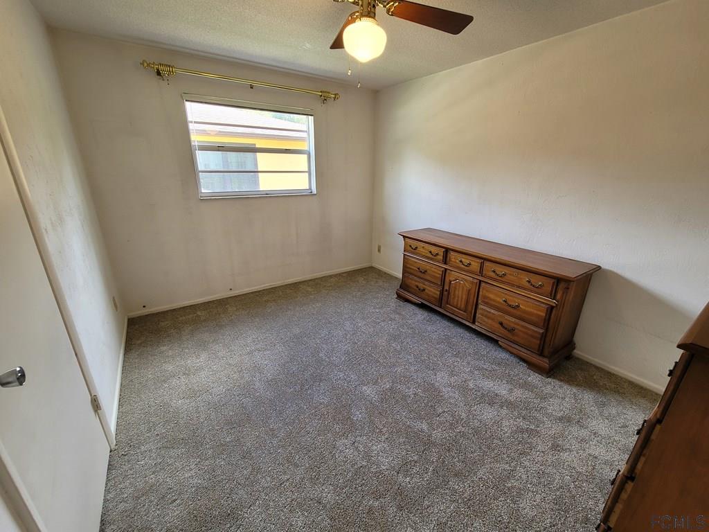 736 Lindenwood Circle Ormond Beach, FL 32174 - Photo 37 of 56 an empty room with windows