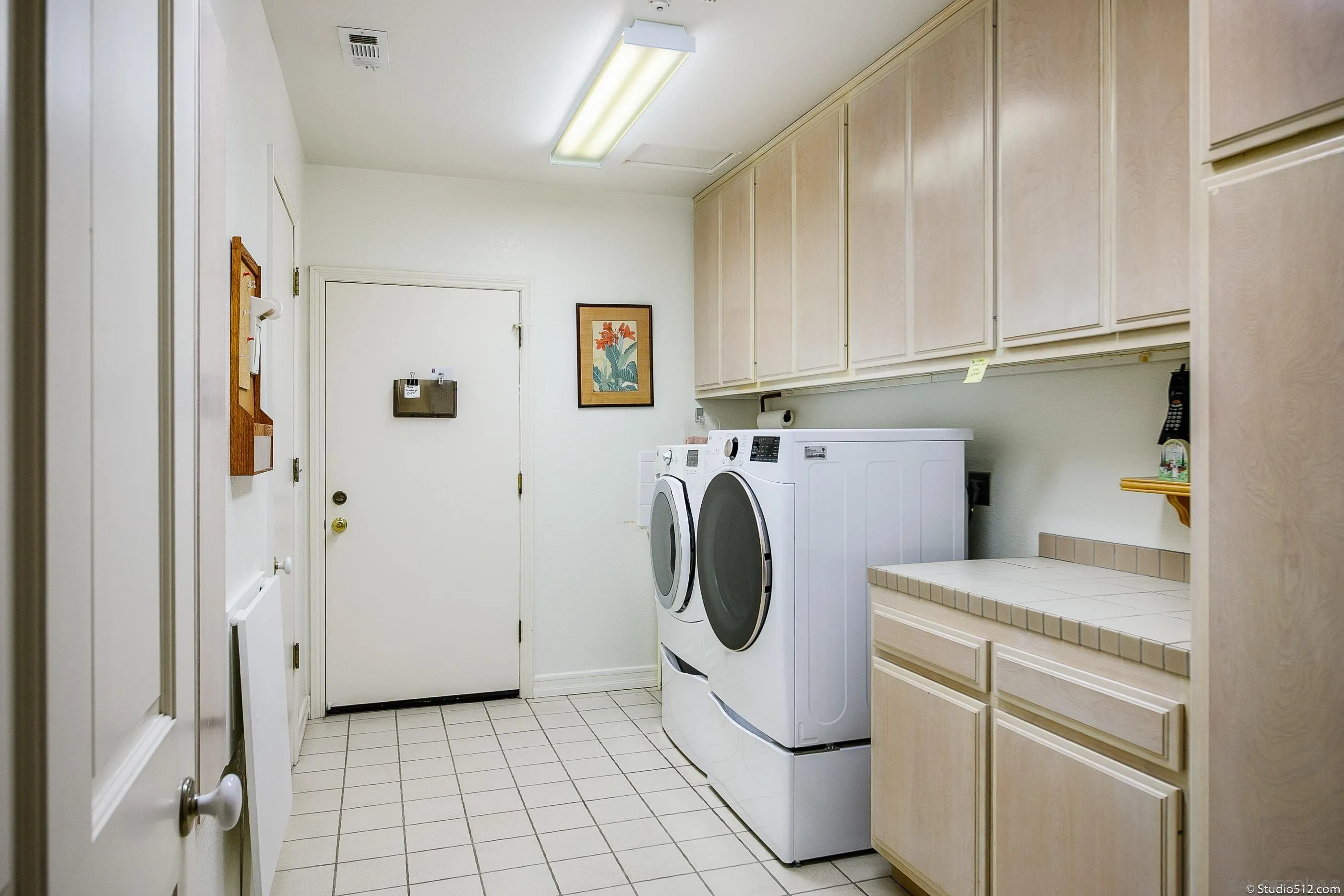 28398 Alamar Road Valley Center, CA 92082 - Photo 14 of 41 a utility room with dryer and washer