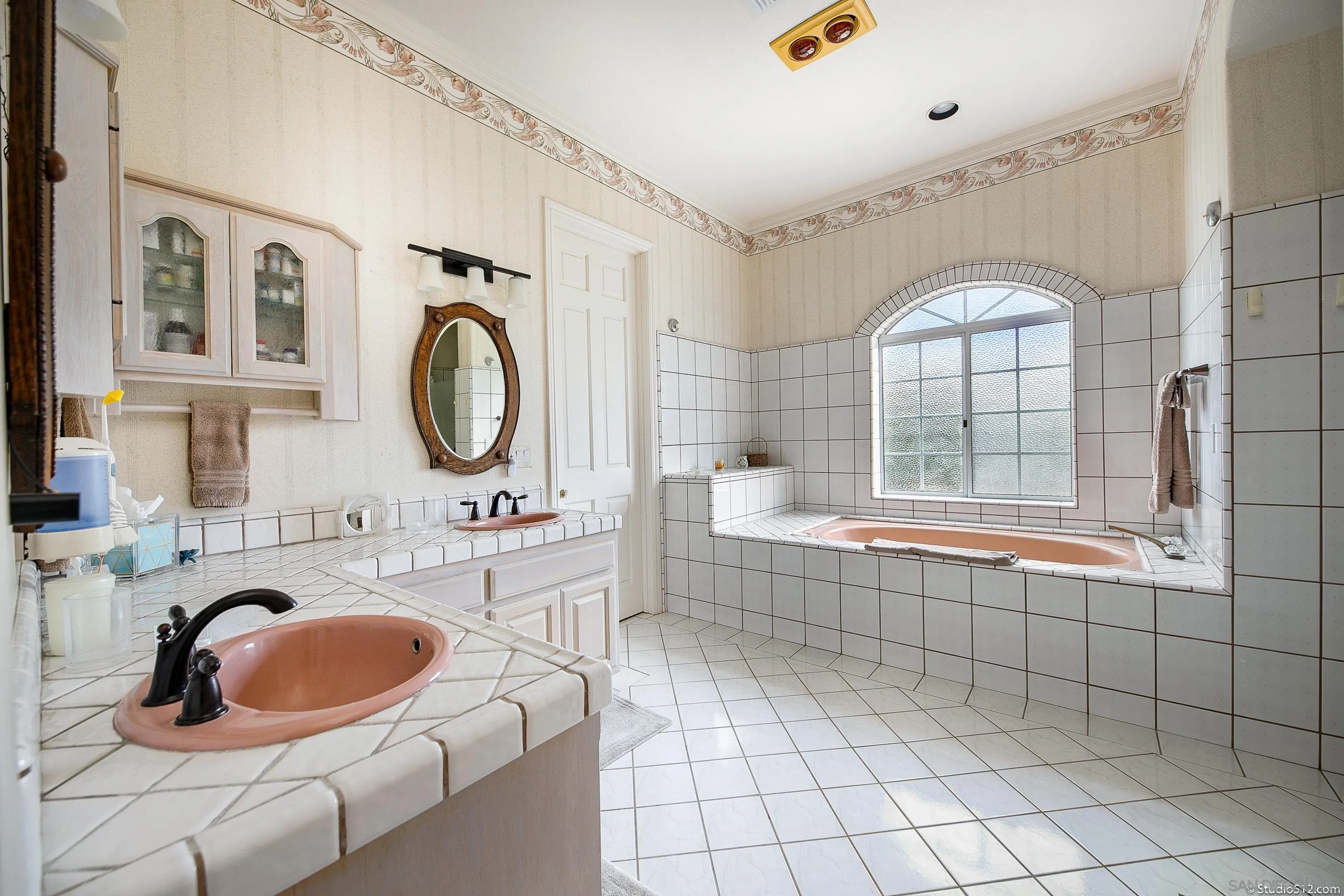 28398 Alamar Road Valley Center, CA 92082 - Photo 17 of 41 a bathroom with a sink mirror and bathtub